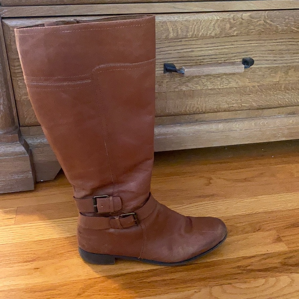 Tall brown leather boots